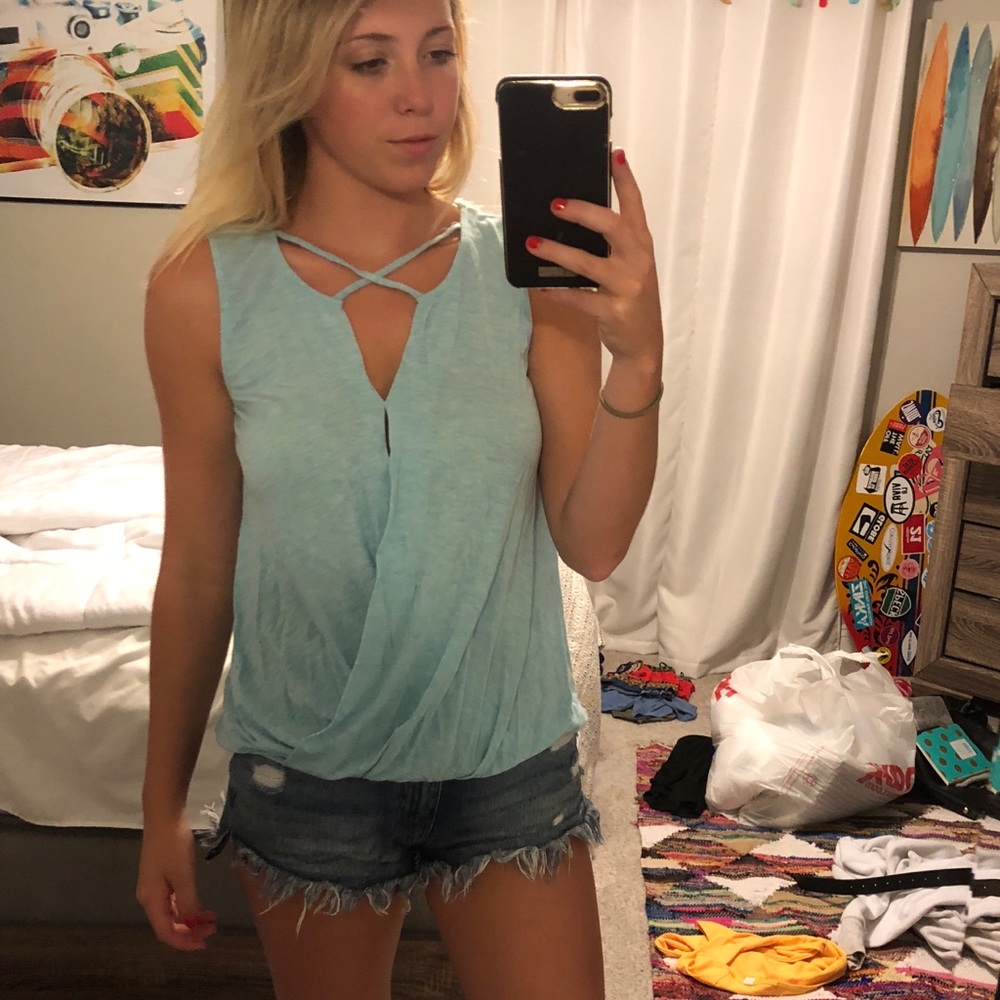 Blue naked zebra cross top